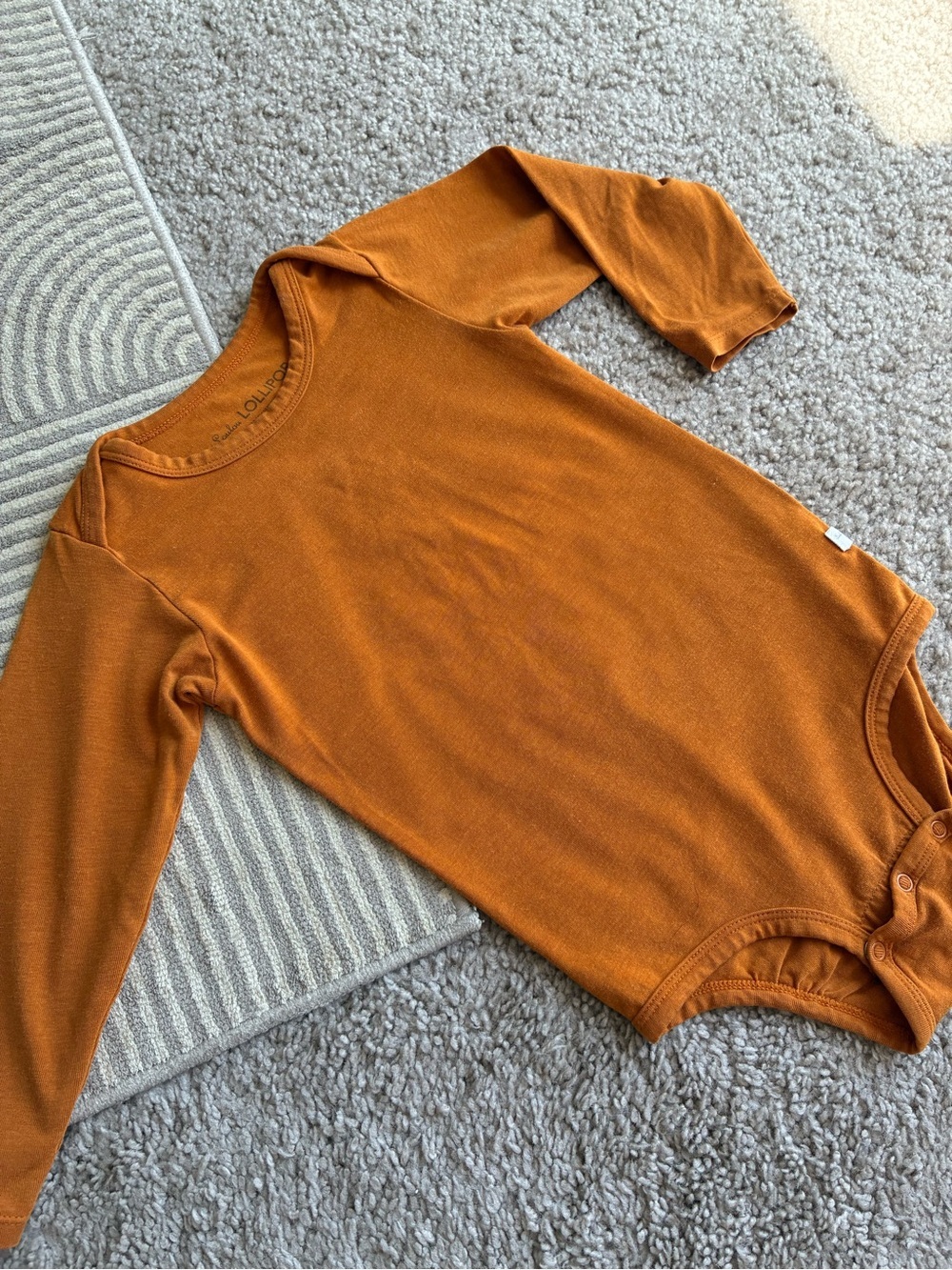 Loulou Lollipop Tencel Unisex Long Sleeve Kids One-Piece Bodysuit in Rust Orange